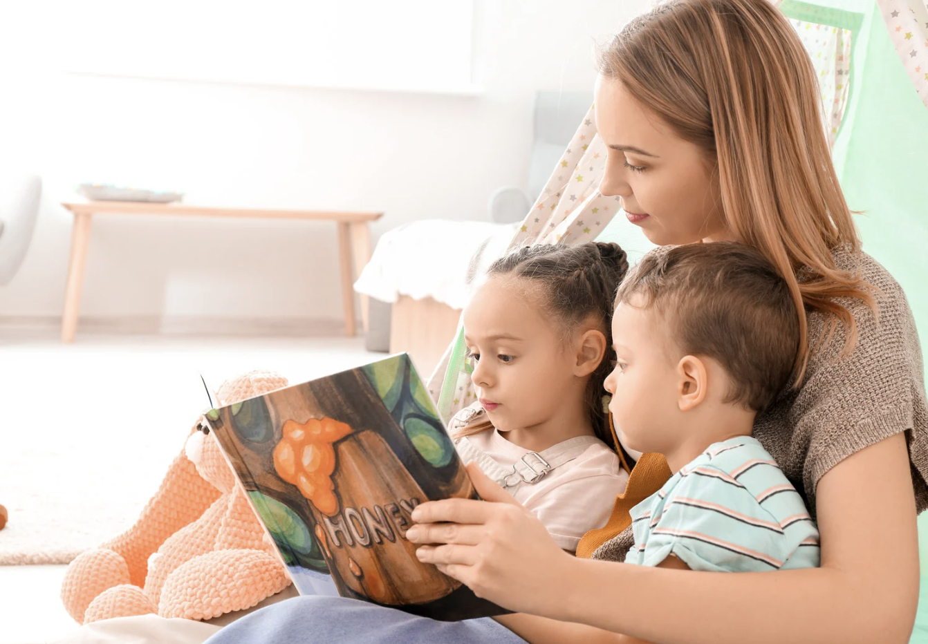 parents reading books to children